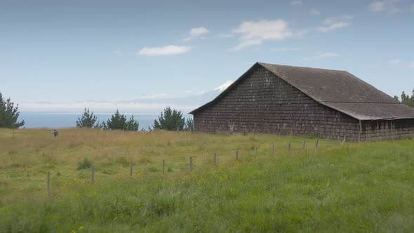 Aerial Shot of a Country House and Llanquihue Lake at Puerto Varas, Chile, South America.