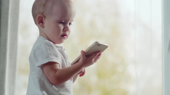 Baby Boy Learning New Smartphone