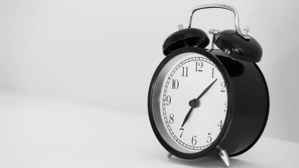 Close Up of Vintage Alarm Clock Bell Ringing alt