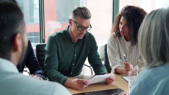 Businessman Signing Contract at Group Meeting Handshaking Business Partner alt