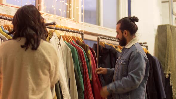 Couple Choosing Clothes at Vintage Clothing Store 11 alt