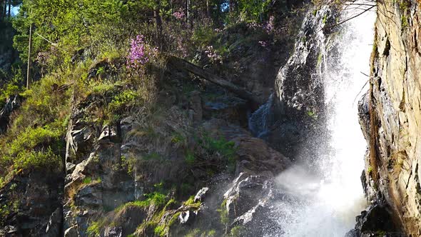 Kamysh Waterfall at Sunset Light Spring Time in the Altai Republic Siberia Russia alt