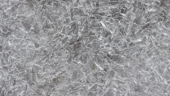 Closeup Ice Texture with Many Cracks Slow Motion Natural Natural Background alt