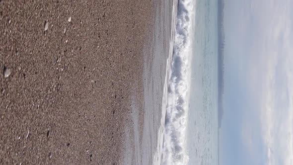 Vertical Video Sea Near the Coast  Closeup of the Coastal Seascape alt