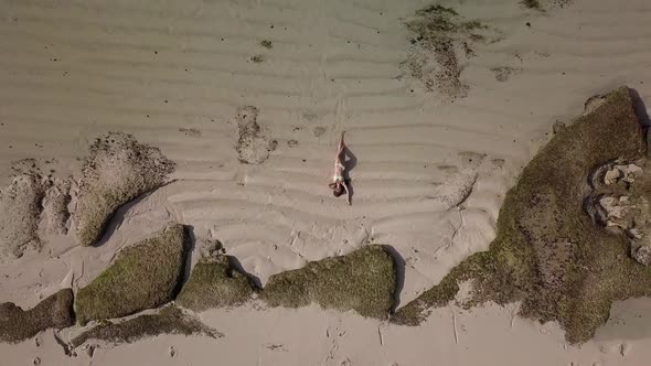 Top View of a Girl Lying on Beach