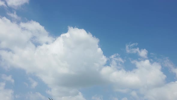 Time Lapse 4k Motion of White Clouds on Blue Sky background