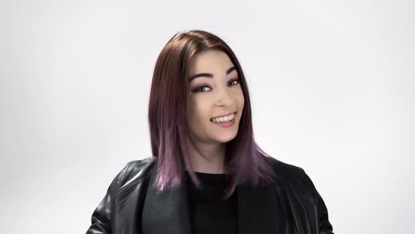 Portrait of a Young Astonished Woman Saying Wow on the White Background alt
