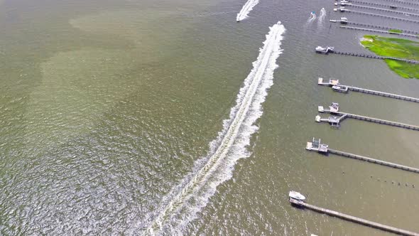 Two boats passing on coast alt