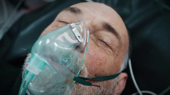Aged Man in Oxygen Mask alt
