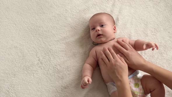 Health Skin Care Development Pediatrics Infant Closeup Mother Hands Give Naked Newborn Baby Child alt