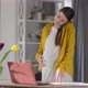 Portrait of Positive Pregnant Woman Talking on Phone Smiling Working at Home Indoors - VideoHive Item for Sale