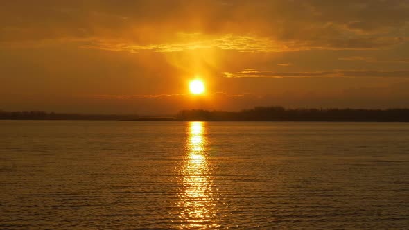 Colour Sunset Over The River With Sun And Orange Clouds alt