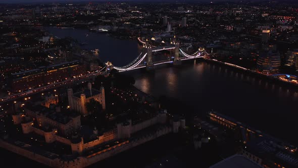 Aerial Night View of Tower of London Castle and Tower Bridge alt