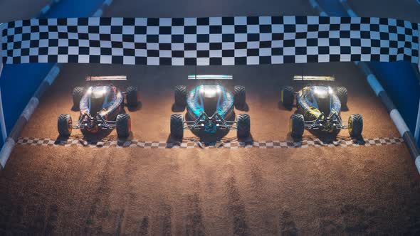 Three RC-cars standing on a start line, ready for a night toy race. 4KHD alt