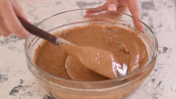 Mixing Dough for Chocolate Cake in a Bowl
