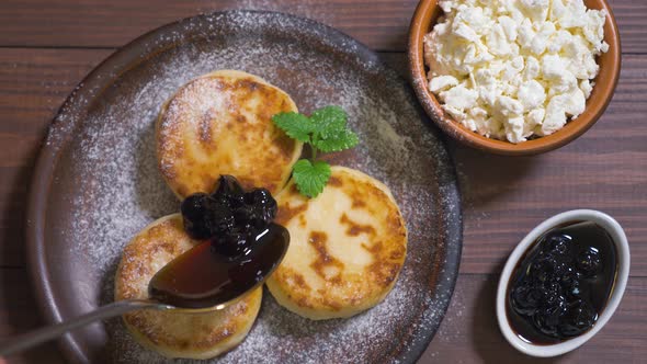 Cottage Cheese Pancakes, Syrniki with Cherry Jam