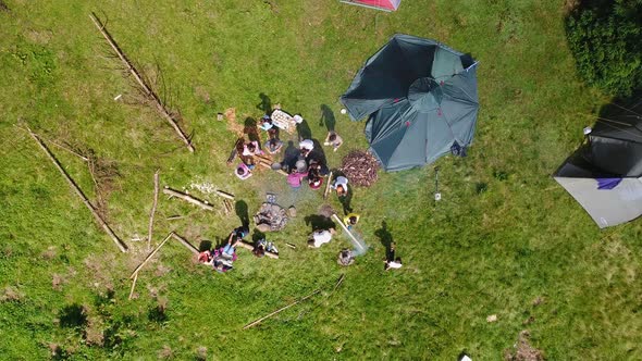 Aerial shot mountain forest with camp