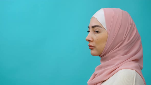 Close Up Side View Profile Charming Beautiful Young Arabian Asian Muslim Woman in Abaya Hijab Turn