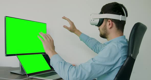 Man Wear VRheadset and Interactive Touch Over Air alt