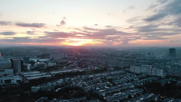 Aerial view of a city at sunset