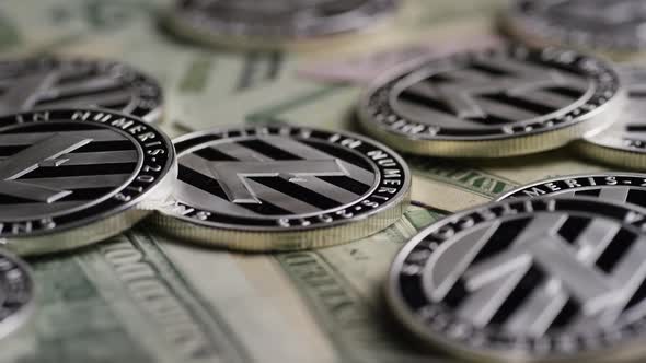 Rotating shot of Bitcoins (digital cryptocurrency) - BITCOIN LITECOIN alt