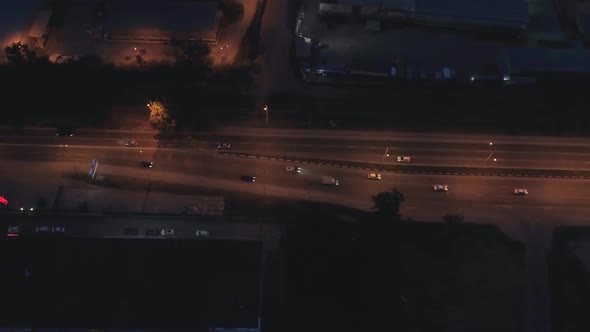Top down Aerial view of the night highway with cars in the city 15 alt