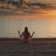 Girl Meditating on the Seashore