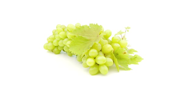 Green Grapes Rotating on White