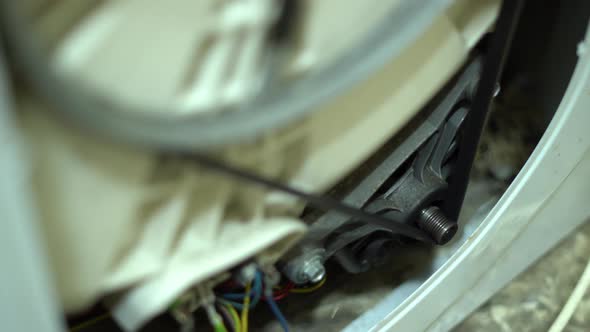 Oscillation of the Drum of the Testing Machine During the Wash Cycle Rear View alt