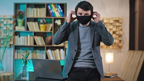 Good Looking Office Manger in Front of the Camera alt