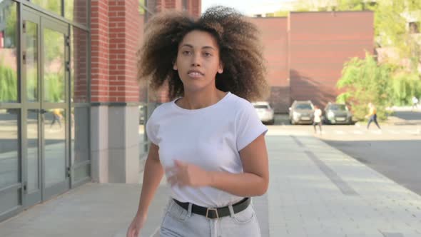 Slow Motion of Running African Woman alt