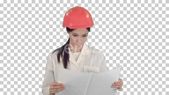 Young engineer woman wearing safety helmet, Alpha Channel