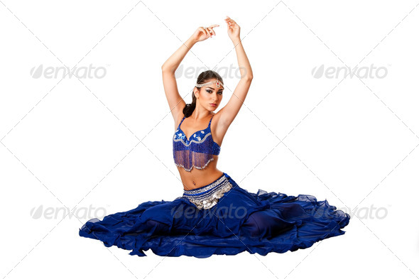 Belly dancer sitting on floor - Stock Photo - Images