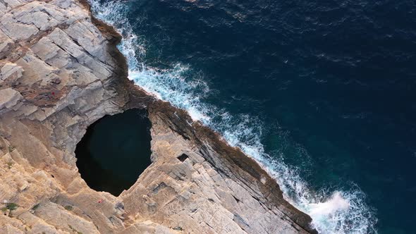 Flying Over Epic Seaside Natural Rocky Pool. Giola Lagoon, Thassos Island, Greece, Aerial View alt