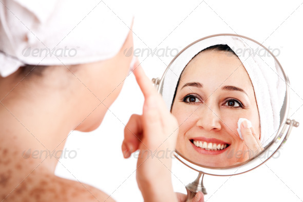 Facial skincare anti-ageing exfoliation - Stock Photo - Images