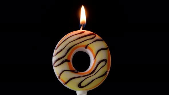 Burning Birthday Candles Isolated on Black Background Number 0
