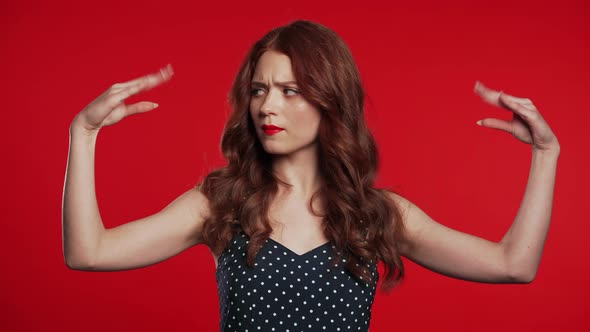 Pretty Girl Showing with Hands and Two Fingers Like Quotes Gesture, Bend Fingers alt