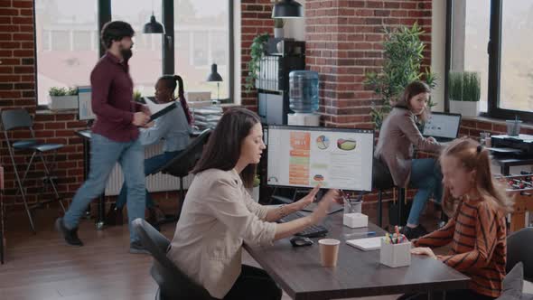 Single Mom at Work Trying to Calm Loud Daughter Disturbing Colleagues alt