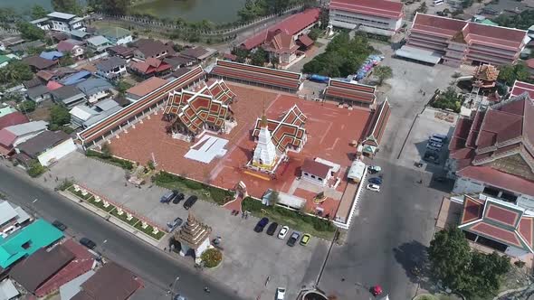 Aerial Footage of Historic Wat Phra That Cheung Chum Temple, Landmark of Sakonnakorn, Thailand alt
