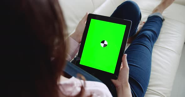 Woman Holding Tablet Chromakey Indoors