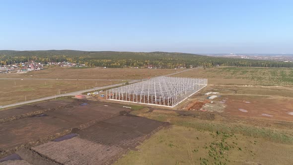 Construction Of Industrial Buildings From Metal and concrete Constructions, Aerial Shot 05 alt