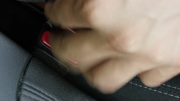 Locking car belt buckle on driver seat 4K video alt