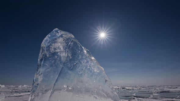 Timelapse of Sun Trough Transparent Ice Floe on Frozen Lake