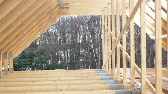 Wooden Skeleton Frame of House Roof and Attic Section alt