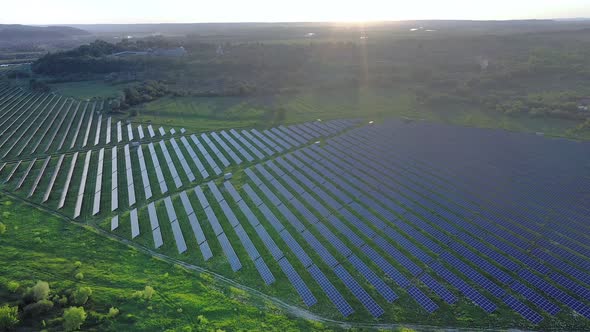 Solar panel produces green, environmentaly friendly energy. Aerial view from drone alt