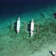 Aerial fly-over view of boats at Entalula Island, Bacuit Bay, El-Nido. Palawan Island, Philippines - VideoHive Item for Sale