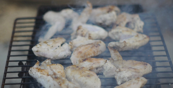 Chicken Wings Are Fried On The Grill 1