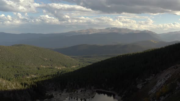 Aerial Drone footage in the mountains of Colorado near St. Mary's Glacier. Overlooking the mountains alt