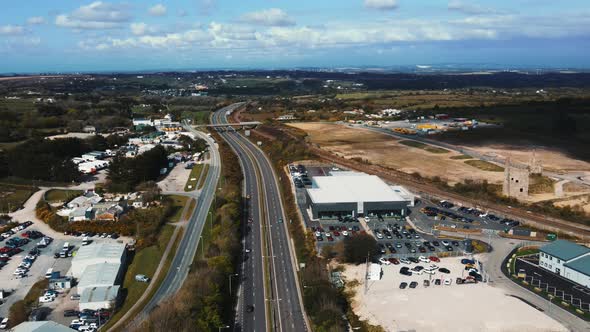 Cars are moving on the highway Parking with many different vehicles