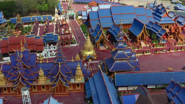 Aerial View of Wat Phiphat Mongkhon Blue Temple in Sukhothai Thailand alt
